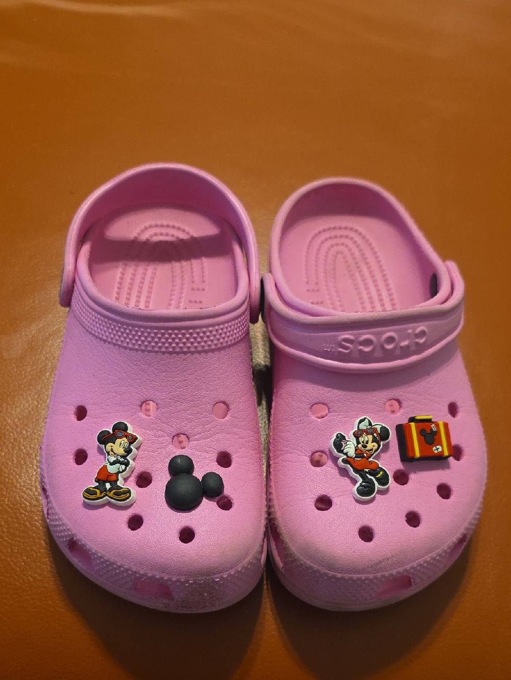 CROCS Kids Pink Clog Sandals with Character Charms